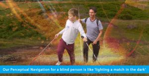 A hybrid photo shows World Access For The Blind Founder and President Daniel Kish walking up a hill in Scotland behind WAFTB student Ethan Loch. Both are holding full-length navigation canes, while Ethan also holds a hiking pole. Superimposed is a photo of of a match head string and shooting sparks. The banner text reads: Our Perceptual Navigation for a blind person is like 'striking a match in the dark'.