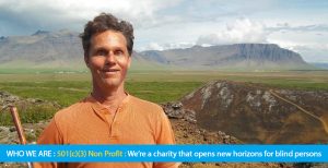 Page Banner shows a photo of Daniel Kish hiking ion a glacial lake bed in Iceland with a mountain range on the horizon. Text band reads: Who We Are: 501c3 Non Profit:We're a charity that opens new horizons for blind persons.