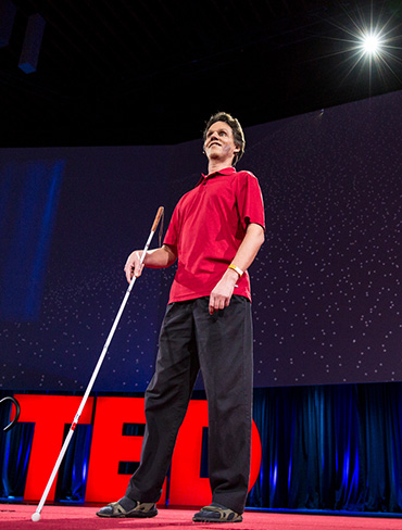 Photo of Daniel Kish on stage at the global TED Conference in Vancouver.