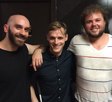 Photo of Brian Bushway backstage with Sam and Casey Harris of X-Ambassadors.